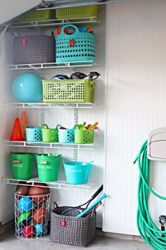 a bike is parked in front of some baskets and other items on shelving units