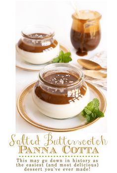 two small jars filled with chocolate pudding on top of a plate