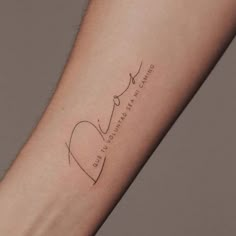 a person's arm with a tattoo that reads, love is always in the air