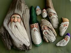 seven gnomes are sitting next to each other