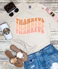 This Thankful Graphic Tee Shirt is just adorable! A must have for every Thanksgiving dinner! Pair with leggings or jeans for a super cute and comfy look! Soft-washed T-shirt For Fall Loungewear, Trendy Comfortable Fit T-shirt For Fall, Trendy Comfort Fit T-shirt For Fall, Soft-washed T-shirt For Fall, Fun Fall Loungewear Tops, Cute Fall T-shirt With Relaxed Fit, Trendy Tops With Funny Print For Fall, Trendy Funny Print T-shirt For Fall, Trendy T-shirt With Funny Print For Fall