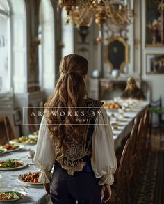 a woman with long hair standing in front of a table full of plates of food