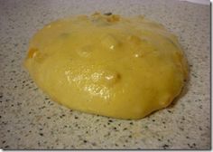 a ball of dough sitting on top of a counter