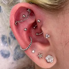 a woman with ear piercings on her ears