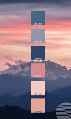 the sky is pink, blue and purple with mountains in the background