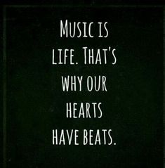 a sign that says music is life that's why our hearts have beats