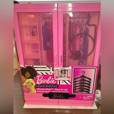 barbie's fashionistas doll display case in pink