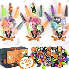 three halloween themed items are on display in front of a box with the number 28