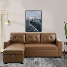 a living room with a brown leather couch