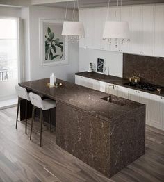 a kitchen with marble counter tops and an island in front of the stove top oven