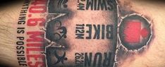 a close up of a man's arm with tattoos on it and the words bike