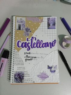 a spiral notebook with the words casteellano written in purple and surrounded by other writing supplies