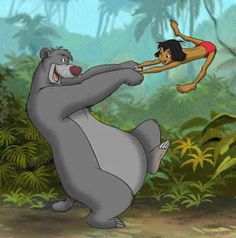 the jungle book character is being chased by an animal in front of a man on his back