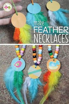 some colorful feathers are hanging from the side of a table with name tags on them