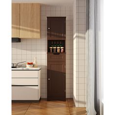 an empty kitchen with wooden cabinets and white tile walls, along with wood flooring