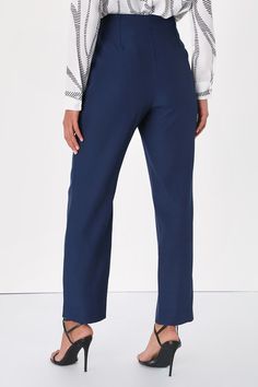 Behind every successful woman, is the Lulus Build Your Dreams Navy Blue Straight Leg Trouser Pants! These chic office pants are composed of woven fabric that shapes a high-waisted fit with a top clasp, hidden button-closure, and zip fly. Two functional welt pockets top relaxed, straight pant legs that end at a trendy ankle-length hem. Exposed seam detailing gives these pants a tailored finish! Fit: This garment fits true to size. Length: Ankle length. Size medium Inseam: 28.00 Front Rise: 13.75 Blue Office Pants With Pockets, Blue Office Wear Pants With Pockets, Elegant Stretch Blue Bottoms, Elegant Blue Stretch Bottoms, Modern Tapered Leg Bottoms For Workwear, Versatile Pull-on Dress Pants For Work, Casual Blue Pants For Office, Modern Tapered Leg Workwear Bottoms, Casual Blue Pants For The Office