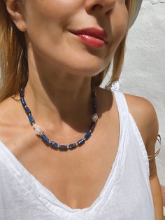 This eye-catching necklace is made of genuine lapis lazuli beads of intense rich dark blue color with small inclusions of pyrite.  Adorned with one large baroque pearl and one Edison pearl. All metal parts are gold vermeil (18k gold over sterling silver).  Measures 45 cm (near 18 inches).  Necklace comes in a gift box. Shipment worldwide with registered trackable post.  SPECIAL OFFERS: ✦ Special 10% OFF when you order 2 items!! Apply Coupon Code: SAVEMORE2 ✦Special 15% OFF when you order 3 or more items!! Apply Coupon Code: SAVEMORE3 You might also like other lapis lazuli necklaces from my shop: https://www.etsy.com/listing/970225564 https://www.etsy.com/listing/1259657752 https://www.etsy.com/listing/1070688780 * Please visit my official website: https://essenzialejewelry.com * Please fol Baroque Pearls Necklace, Edison Pearls, Lapis Lazuli Necklace, Lapis Lazuli Beads, Pearls Necklace, Baroque Pearl Necklace, Dark Blue Color, Blue Necklace, Necklaces For Women