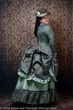 A 1870 day dress by Prior Attire. Pattern and instructions available in our book, The Victorian Dressmaker. Photo by Timelight Photographic. Formal Black Victorian Dress With Historical Design, Victorian Floor-length Costume Dress With Historical Design, Black Victorian Dress With Historical Design, Victorian Seamstress, Bustle Dress Victorian, 1870 Dress, Antique Furniture Victorian, Ideal Husband, Black And White Striped Victorian Dress