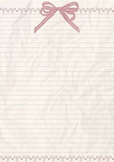 a piece of lined paper with a pink bow on it