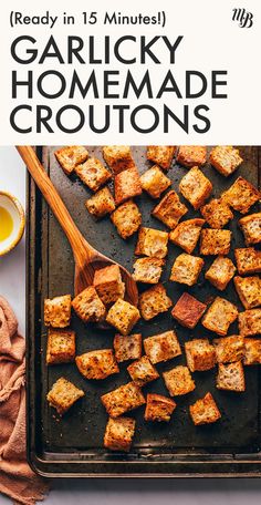 a pan filled with homemade croutons on top of a table