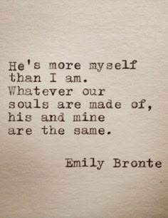 an old typewriter with the words, he's more myself than i am whatever our soul is made or his and mine are the same