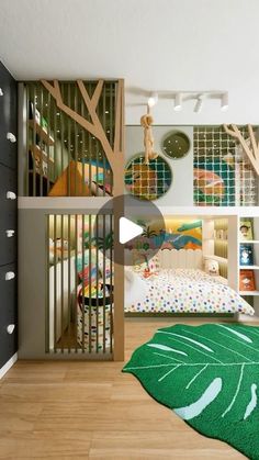 a child's bedroom with green rugs and trees on the wall behind it