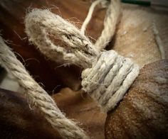 rope and nuts are tied together on the table