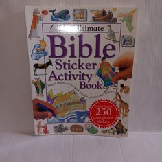 the ultimate bible sticker activity book is shown in front of a white sheeted background