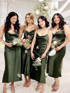 the bridesmaids are all dressed in green dresses