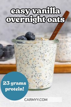 overnight oatmeal in a glass with blueberries and cinnamon on the side