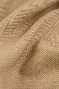 ITALIAN DESIGNER WOOL TWEED FABRIC BY HALF YARD This beautiful wool coat fabric, made in Italy, comes from a high-end designer deadstock and is distinguished by its luxurious feel, excellent quality, and timeless herringbone pattern in soft beige tones. This exclusive wool tweed stands out for its origin and quality. Not only is it warm and soft, but also breathable, durable, and comfortable to wear. Ideal material for high-quality sewing projects such as coats, blazers, and jackets. 𝑷𝑹𝑶𝑫𝑼? Beige Wool Tweed Jacket For Tailoring, Winter Beige Wool Tweed Jacket, Beige Wool Tweed Jacket For Winter, Classic Cream Wool Tweed Jacket, Cream Wool Tweed Jacket For Fall, Wool Fabric Texture, Herringbone Fabric, Suiting Fabric, Herringbone Tweed