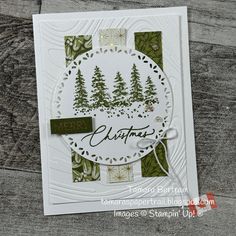 a christmas card made with stampin's evergreens and the words merry written on it