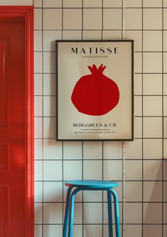 a blue stool in front of a white tiled wall with a red door and poster on it