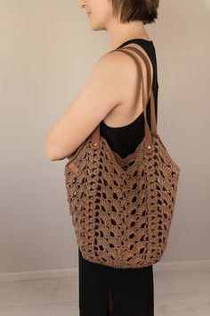 This raffia crochet shopper bag made of natural organic raffia will be your perfect accessory for warm summer days.  Organic raffia is an environmentally friendly raw material. This is a 100% natural material, avocado fibers and banana leaves are used for production. ♥ Raffia is strong and elastic, it holds its shape and volume well, so products made of it can be folded and bent, if necessary. ♥  Raffia is resistant to moisture and burning. ♥  Raffia products are light and pleasant to the touch, Handwoven Brown Hobo Bag For Summer, Summer Brown Handwoven Hobo Bag, Brown Handwoven Hobo Bag For Summer, Chic Open Weave Straw Bag For Market, Eco-friendly Crochet Tote Beach Bag, Eco-friendly Crochet Beach Tote Bag, Eco-friendly Jute Hobo Bag For Summer, Summer Jute Hobo Bag With Braided Handles, Eco-friendly Brown Hobo Bag For Summer