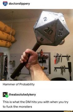 a man holding a metal object in his hand with the words hammer of probability on it