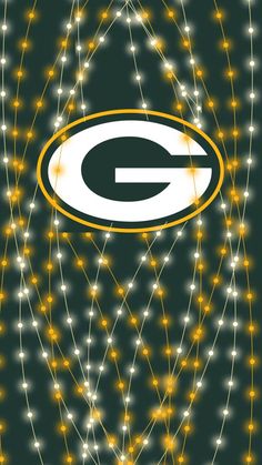 the green bay packers logo is surrounded by lights