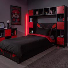 a bedroom with red and black furniture in the corner, including a book shelf above the bed