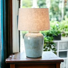 Aqua Reactive Glaze Stoneware Table Lamp with Linen Shade - 17-in. x 26-in. - Mellow Monkey Bedside Lamp Farmhouse, Coastal Table Lamps, Stoneware Lamp, Blue Glass Lamp, Lamp Nightstand, Farm Road, Tall Table Lamps, Lamp Ideas, Coastal Boho