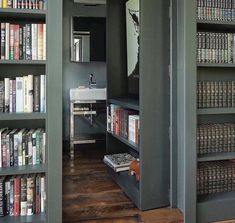 an open bookcase with many books in it