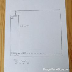 a paper with a drawing of a floor plan on it