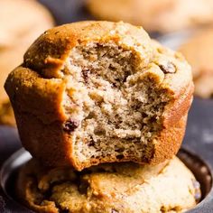 two banana muffins stacked on top of each other