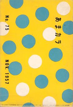 a yellow and blue poster with white polka dots