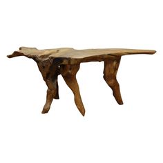 a wooden table that has been made to look like an animal's legs and feet