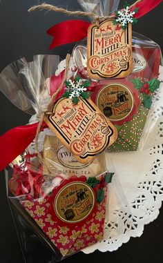 three christmas cookies in a gift box on a doily