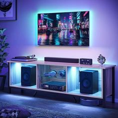 an entertainment center with speakers and lights on it