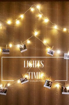 the lights time collection is displayed on a wall with pictures and string lights hanging from it