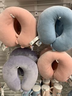 several pillows are stacked on top of each other in the shape of doughnuts