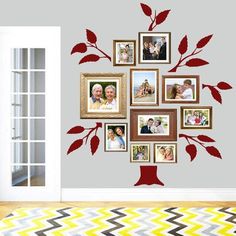 a family tree with many pictures on it and an area rug in the foreground