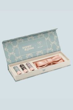 This coquette-coded lip balm gift set will make you feel like your French dreams. Each limited edition gift set features 3 French inspired lip balms: French Macaron, Strawberry Bonbon, & Crème Brûlée, and a custom Kaxi velvet pink bow. French Macaron: This luxurious balm captures the essence of a freshly baked macaron, blending sweet almond, and rich cream for a truly decadent flavor experience. Strawberry Bonbon: This delightful balm captures the sweet essence of your favorite candy, blending l Lip Balm Branding Design, Pink Gloss, Lip Balm Gift, French Macaron, Velvet Pink, Blue Handbags, Princess Castle, French Macarons, Favorite Candy