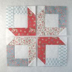 four blocks are arranged in the shape of an origami flowered star, each block has different colors and patterns